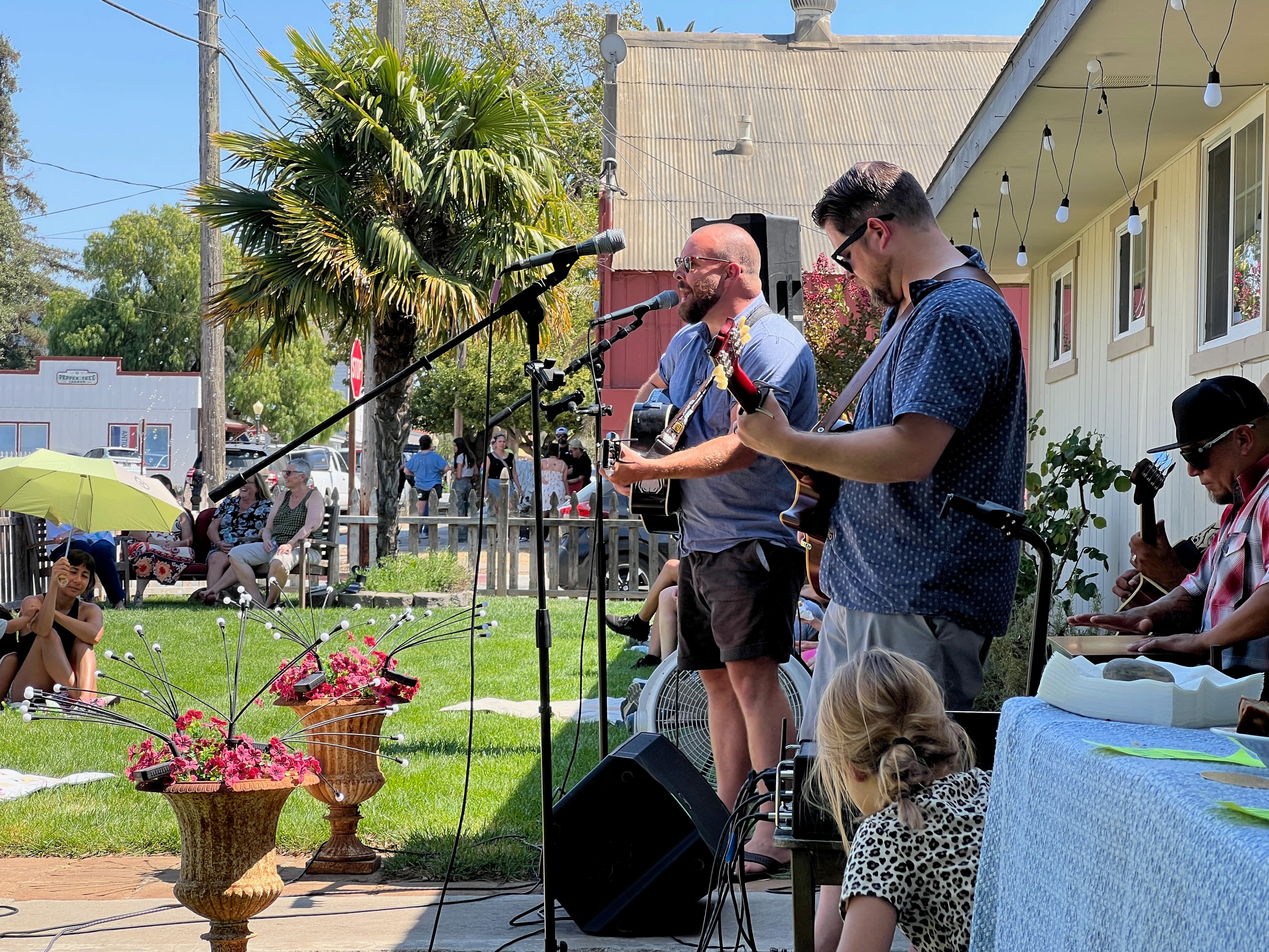 Musicians performing outdoors at Play Music on the Porch Day SJB