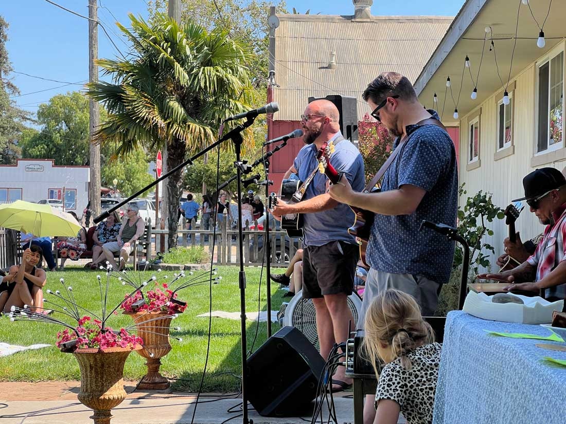 San Juan Bautista plays music on the porch